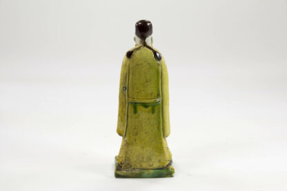 Figur, China, 16./17. Jh., Susancai, in gelb, grün und aubergine, Gebrauchsspuren. H: 13 cm.
