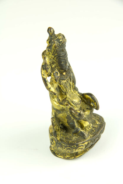 Kleine Figur, wohl Tibet, 17. Jh., Bronze, Jambhala, Gott des Reichtums, mit Goldlack überzogen, schöne Patina, H: 8 cm.