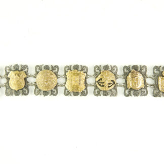 Armband, Mexiko, 20. Jh., 925er-Silber, und 10 Karat Gold, massives, gegliedertes Silberarmband, Glieder mit geprägten, und mit verschiedenen Motiven verzierten Goldblechen, Gebrauchsspuren, L: ca. 20 cm, 50 g.